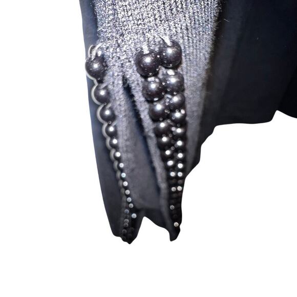 Calligraphy XL, Goth micro ribbed a-line beaded side slit knit midi skirt new
￼ - Picture 3 of 9